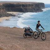 Carucior si remorca de bicicleta, Lionelo, Cama, Multifunctional, Pentru 1 sau 2 copii, Cu sistem de absorbtie a socurilor SIQ, Geamuri cu protectie solara, Negru