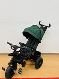 Tricicleta roti cauciuc plin, cu pozitie somn, scaun rotativ, muzica si lumini,culoare  VERDE SMARALD, BBD5299VS