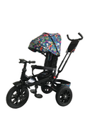 Tricicleta roti cauciuc plin, cu pozitie somn, scaun rotativ, muzica si lumini, culoare Multicolor , BBD5299MC