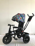 Tricicleta roti cauciuc plin, cu pozitie somn, scaun rotativ, muzica si lumini, culoare Multicolor , BBD5299MC