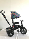 Tricicleta roti cauciuc plin, cu pozitie somn, scaun rotativ, muzica si lumini, culoare Multicolor , BBD5299MC