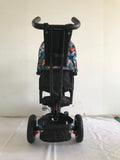 Tricicleta roti cauciuc plin, cu pozitie somn, scaun rotativ, muzica si lumini, culoare Multicolor , BBD5299MC
