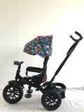 Tricicleta roti cauciuc plin, cu pozitie somn, scaun rotativ, muzica si lumini, culoare Multicolor , BBD5299MC