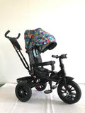 Tricicleta roti cauciuc plin, cu pozitie somn, scaun rotativ, muzica si lumini, culoare Multicolor , BBD5299MC